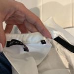 Women size small loose fit white top elegant dressy material Photo 4