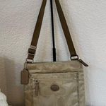 Coach Vintage  Signature Nylon Crossbody Swingpack – Khaki Saddle Photo 0