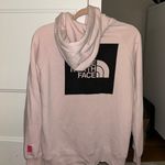 The North Face Hooded Sweatshirt Photo 1