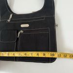 Baggallini  Cross Over Buckle Crossbody Expandable Black Nylon Travel Bag Photo 9