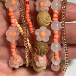 Bracelets 7 handmade beaded stretchy stackable bracelets creamy orange gold Photo 1