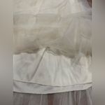 Soho Apparel  Elegant Cream High-Low Skirt Photo 7