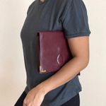 Cartier  Classic Burgundy and Gold Clutch Photo 1