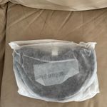 Free People  Bulls Eye Sling Bag. Color black. MSRP $40  Photo 6