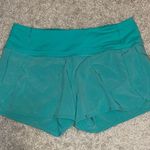 Lululemon  turquoise run times 4" shorts size 6 Photo 0