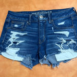 American Eagle  Outfitters Ripped Blue Jean Shortie Shorts Photo 0