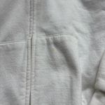White zip up Photo 1