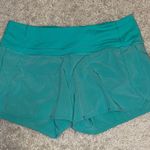 Lululemon Run Times 4” Turquoise Shorts Size 6 Photo 1