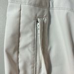 Nike  Women’s Dri-Fit White Golf Pants. size 12. zippered side pkts. EUC Photo 4