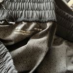 Under Armour NWT Women's UA RUSH™ Woven Upstream Camo Wide Leg Pants Photo 9