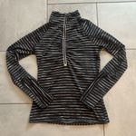 Athleta  Half-Zip Pullover Top in Black and White Stripes Photo 1