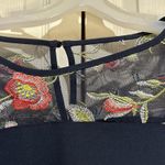 AGB navy dress with sheer floral details at neck and sleeves. Size 10 Photo 2