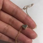 Gold heart charm necklace Photo 0