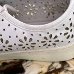 White airy sneakers with flower cutouts Size 8 Photo 2