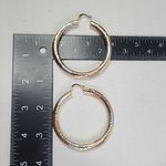 Gold Swirl Diamond Cut Tube Hoop Earrings Photo 7