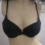 Victoria's Secret push-up demi bra frills around perimeter in black size 34C. Photo 1