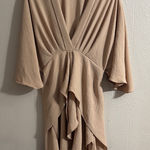 Beige Draped V Photo 0