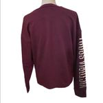 Victoria's Secret Victoria Sport burgundy w/silver sleeve spellout crewneck sweatshirt size M. Photo 2