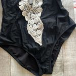 Kona Sol Chic Black Halter Swimsuit with Crochet Detail Photo 1
