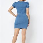 Iris Puff sleeve denim midi. Medium stretch solid color. Cuff bust. Medium. Photo 3