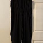 Apt. 9  Jumpsuit size L beautiful kind of silky feelings color black inseam is 26” Photo 8
