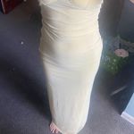 Buttery yellow tight fitting dress Photo 0