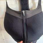 Under Armour  black front zip compression sports bra size 40DDD Photo 1