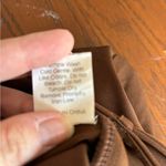 Princess Polly chocolate brown shorts with buckle size 2 Photo 6