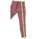 Vuori  Women’s Daily high rise leggings in Spice rust color Size Medium Photo 4