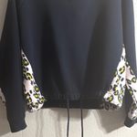 Chic Black Hoodie with Leopard Print Sleeves Size M Photo 1