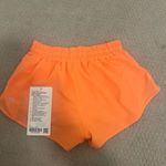 Lululemon hotty hot shorts LR 2.5 inch!! Color orange size 4!! Photo 3