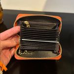 Amazon Orange Leather Wallet with Butterfly Accent Photo 2