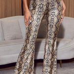 Boutique reptile print flare stretchy pants Photo 0