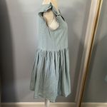 Listicle  • cotton ruffle sleeve mini dress with pockets Photo 33