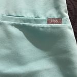 FIGS  Teal Technical Collection Scrub Top Photo 2