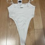 Adika White High Cut Bodysuit Photo 2