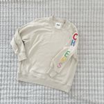 Aerie Cream Sweater with cheers Sleeve Design Photo 1