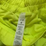 Lululemon Women’s fluorescent yellow  hotty hot low rise athletic shorts Photo 2