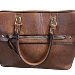 Mathew & Julian Brown Handbag. Outside and Inside Zip Pockets. 2 Flaws as shown Photo 0
