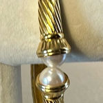 Joan Rivers clamper bracelet signed by Joan Rivers. Absolutely gorgeous gold. Photo 0