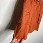Nike  loose fit high rise cargo shorts orange rust women’s size small new‎ casual Photo 4