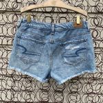 American Eagle AEO Tomgirl Shortie distressed frayed jean shorts Size 4 Photo 1