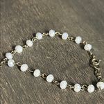 This is a moonstone beaded bracelet with a cushion Photo 2