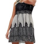 Ultra Pink  Black and White Smocked Mini Sundress Photo 0