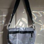 L.L.Bean  purse in gray. The lighting is from the sun through the door. No stains Photo 0