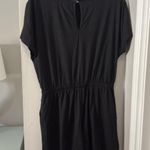 Black t shirt style romper size medium Photo 2