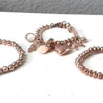 three rose gold charm bracelets boho Photo 2