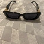 Sunglasses Bllack With Gold Trim.. Worn once Photo 3