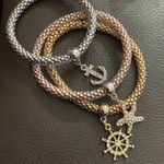 3 Piece Shiny Multilayer Gold Silver and Bronze Bracelet Set Photo 0