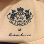 Juicy Couture short sleeve t-shirt w/ pink writing Photo 1